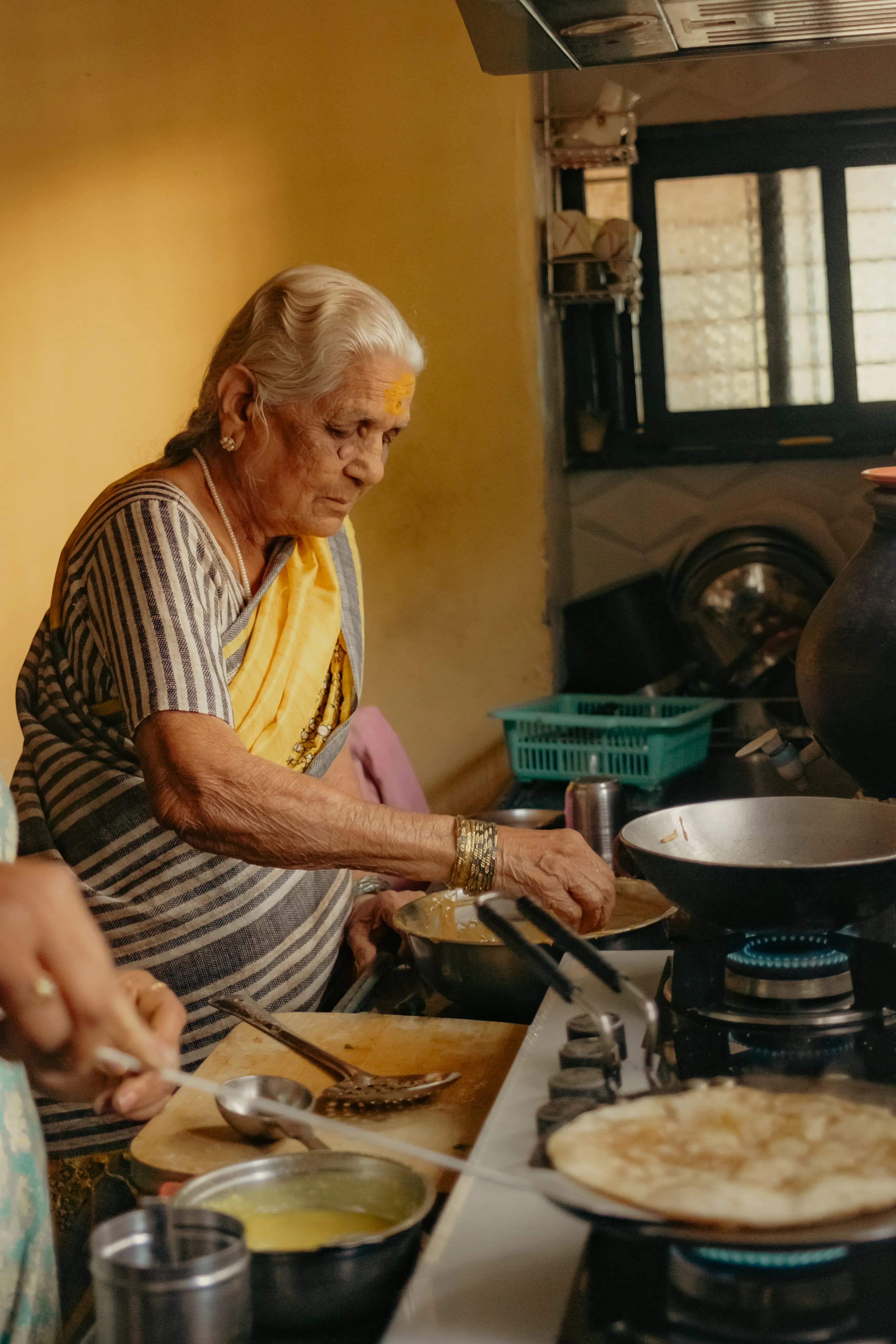 Traditional Indian kitchen — hand-ground spices, mother's recipe